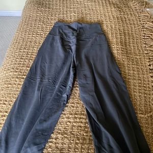 Grey Lululemon wide leg cropped pants.